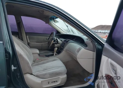 2000 Toyota Avalon Xl from USA, damaged, VIN 4T1BF28B5YU072577